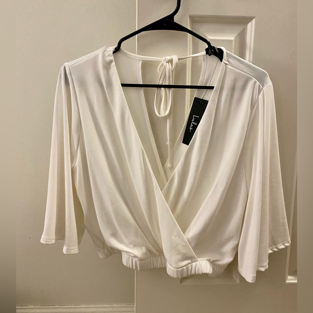 Lulus cropped blouse. New with tags. Never worn.
